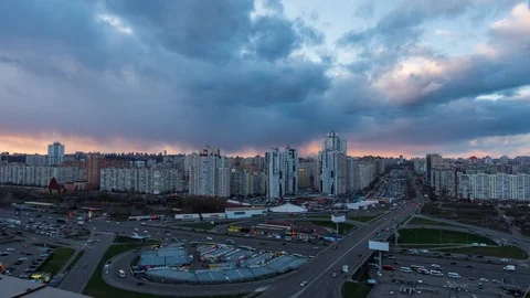 Beautiful sunset with stormy clouds over city 4K Timelapse Stock Footage 126509972