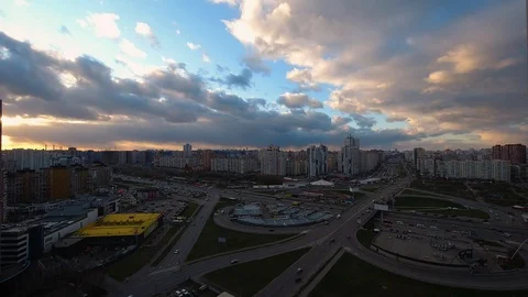 Beautiful sunset with stormy clouds over city 4K Timelapse Stock Footage 127746009