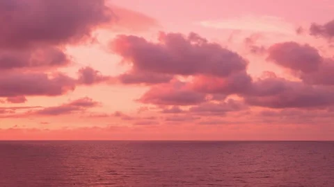 Beautiful Sunset Sun Puffy Clouds in Colorful Sky over Ocean, Time Lapse, Slow M Stock Footage 244300508