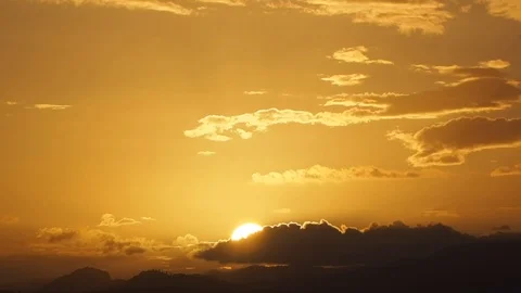 Beautiful sunset, the sun sets behind the clouds. Stock Footage 97930297