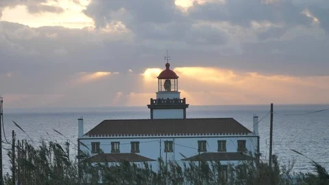 Beautiful Sunset With Sunrays Through Clouds At Light House, Azores Stock Footage 90530251