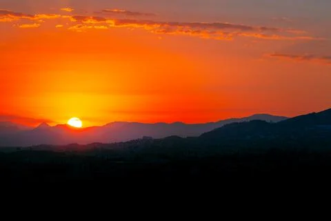 Beautiful Sunset Sunrise Above Dark Mountain Silhouette landscape Stock Photos