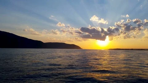 Beautiful sunset sunset on a river with clouds Stock Footage 78764659