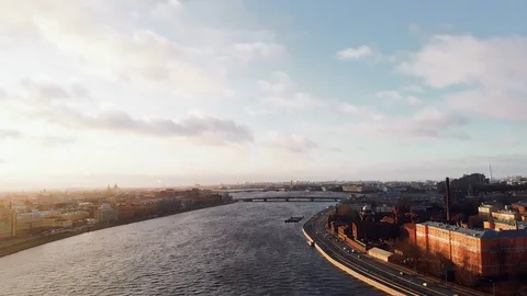 Beautiful sunset through bridges and roads with auto traffic in St. Petersburg Stock Footage