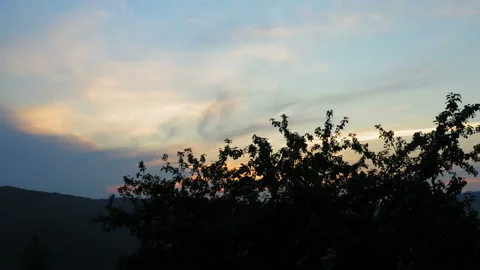 Beautiful sunset through a canopy on a cloudy day 库存影片 137519805