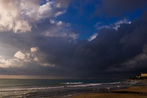 Beautiful sunset with thunderclouds over the Mediterranean sea of Turkey. Stock Photos