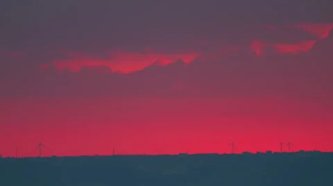 Beautiful sunset time lapse above the Wind turbines on sea coast, HDR RAW shots Stock Footage 63434979