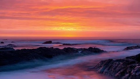 Beautiful sunset time lapse with dramatic clouds and waves Stock Footage 78341757