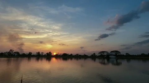 Beautiful sunset, time-lapse, Sunset view from Health Park near pond Stock Footage 99167362