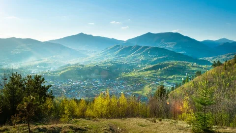 Beautiful sunset timelapse, last rays of sunlight over peaceful rural landsca Stock Footage 129699851
