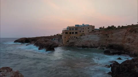 Beautiful sunset timelapse turning into night at Ghar Lapsi, Malta. 動画素材 133313638