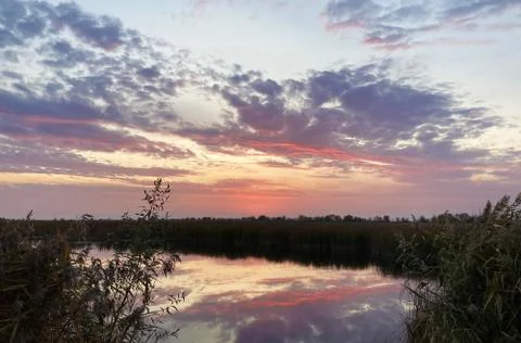 Beautiful sunset under river Stock Photos