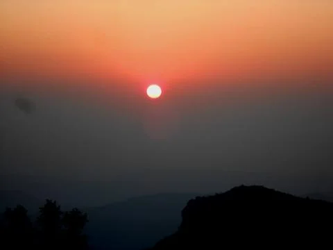 A beautiful sunset view from hills Stock Photos