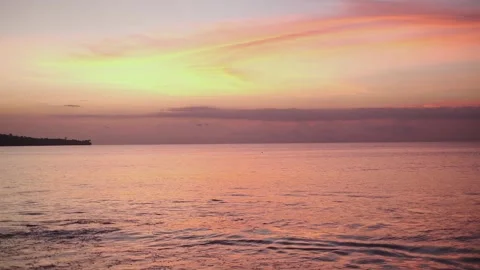 Beautiful sunset view of ocean waves. Handheld view of waves. Stock Footage 151178896