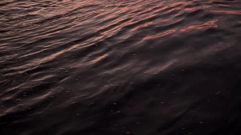 Beautiful sunset view of ocean waves. Handheld view of waves.  Stock Footage 151179068