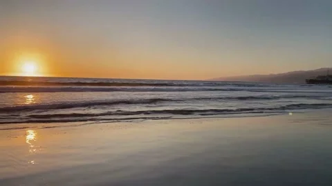 Beautiful sunset view over the beach by the sea Stock Footage 136842567