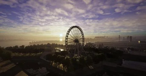 Beautiful sunset view over a ferris wheel near a waterfront Stock Illustration
