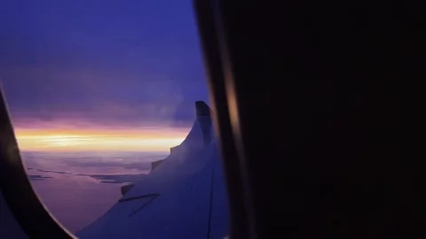 Beautiful sunset view from a plane window Stock Footage 235184555