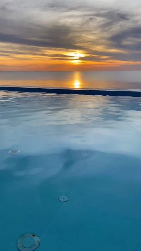 Beautiful sunset view from the pool in Andaman Sea, Thailand. 動画素材 277632908