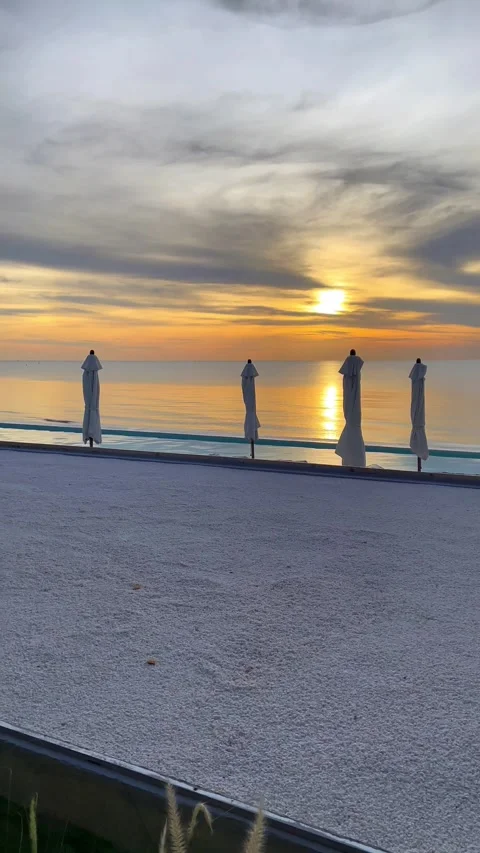 Beautiful sunset view from the pool in Andaman Sea, Thailand. 動画素材 277633624