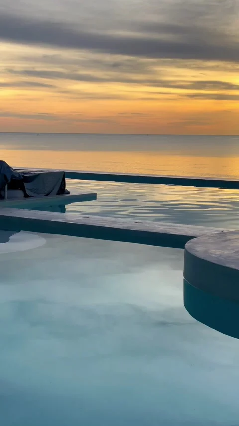 Beautiful sunset view from the pool in Andaman Sea, Thailand. 動画素材 277633625