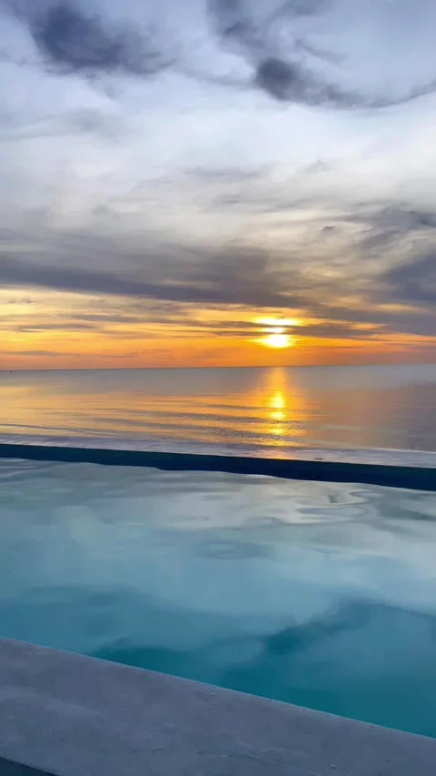 Beautiful sunset view from the pool in Andaman Sea, Thailand. 動画素材 277633633