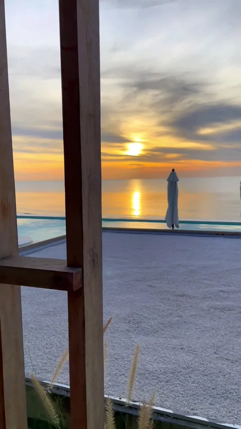 Beautiful sunset view from the pool in Andaman Sea, Thailand. 動画素材 277633643