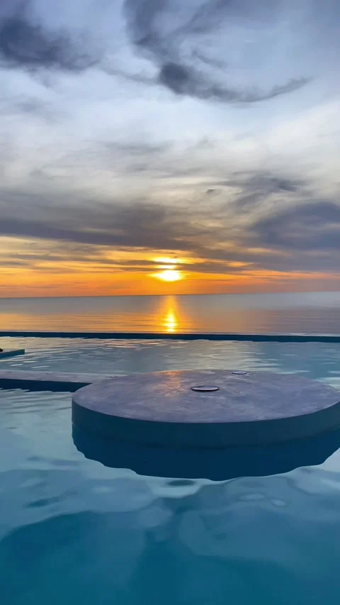Beautiful sunset view from the pool in Andaman Sea, Thailand. 動画素材 277633802