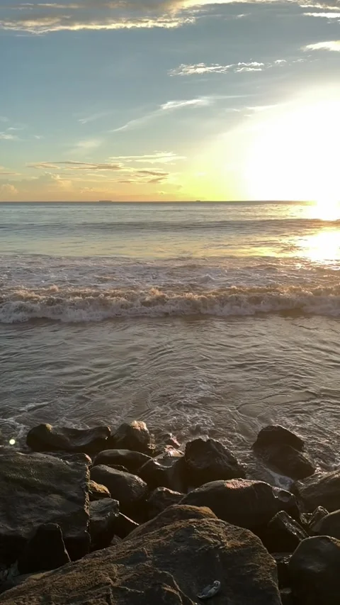 Beautiful Sunset View of Sea Waves Rolling Toward Rocky Stock Footage 345953823