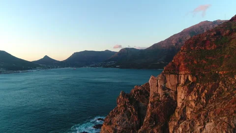 Beautiful sunset view of steep cliffs that run into the ocean Stock Footage 170579333