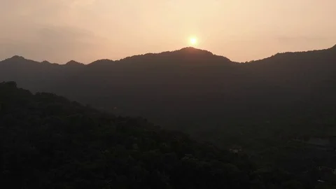 Beautiful sunset view surrounded by mountains in Hangzhou city, China Stock Footage 121392967