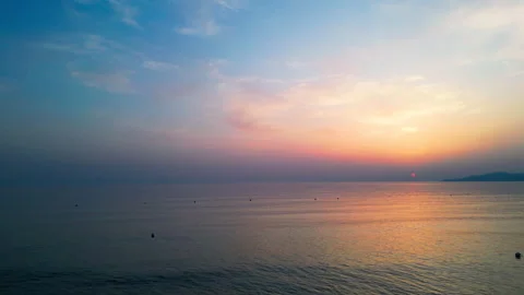 Beautiful sunset view, then looking down at the sea Stock Footage 248467853