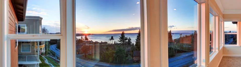 Beautiful sunset view through the windows. panoramic picture Stock Photos