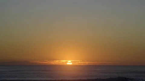 Beautiful sunset with waves rolling in Stock Footage 205117338