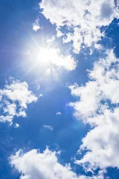 Beautiful sunshine and soft clouds on blue sky Stock Photos