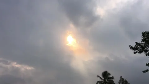 Beautiful Sunshine Behind The Clouds Stock Footage 243988416