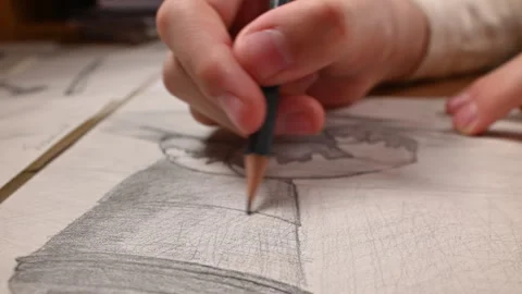 Beautiful super close-up of the shading process, pencil drawing on white paper. Stock Footage 273986976