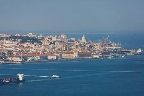 Beautiful super wide-angle panoramic aerial view of Lisbon, Portugal with har Stock Photos