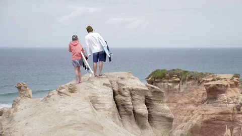 Beautiful Surf Spot Cliff View Surfers Slowmotion 4k Video stock 77249855
