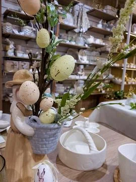 Beautiful table decorations for the Easter holiday. The branch of the green.. Stock Photos
