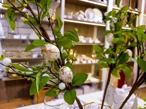 Beautiful table decorations for the Easter holiday. The branch of the green.. Stock Photos