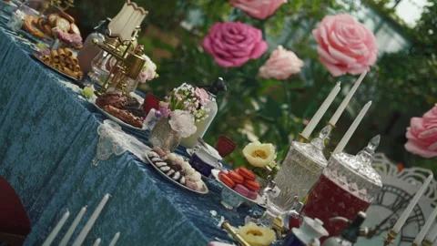 Beautiful table full of fruit and drink in inside on the table garden background Stock Footage 195934156