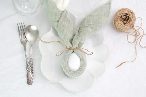 Beautiful table serving for Easter celebration in dining room, plate with easter Stock Photos