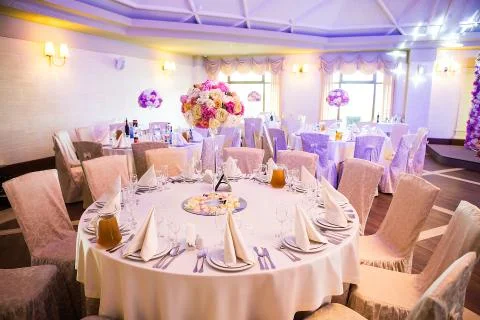 Beautiful table set for some festive event, party or wedding reception. Stock Photos