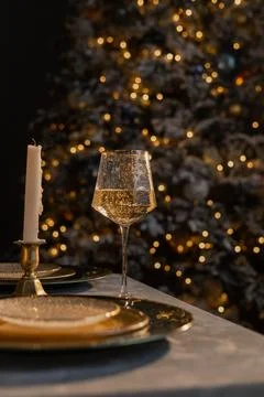 Beautiful table setting with Christmas decorations in living room Stock Photos