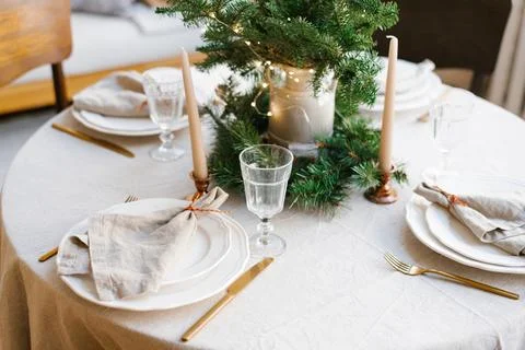 Beautiful table setting for Christmas dinner in Scandinavian style 写真素材