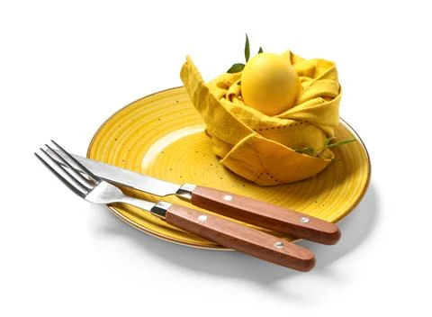 Beautiful table setting with Easter egg and leaves on white background Stock Photos