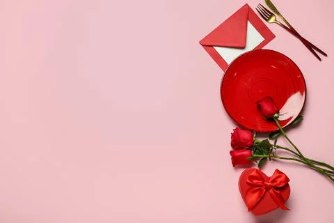 Beautiful table setting for Valentine's Day with gift box, envelope and rose  Stock Photos