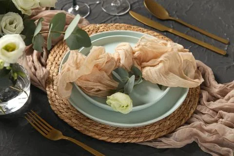 Beautiful table setting for wedding with eucalyptus branches and eustoma flow Stock Photos