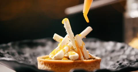 Beautiful tart with decorative elements served in restaurant Stock Footage 178509640